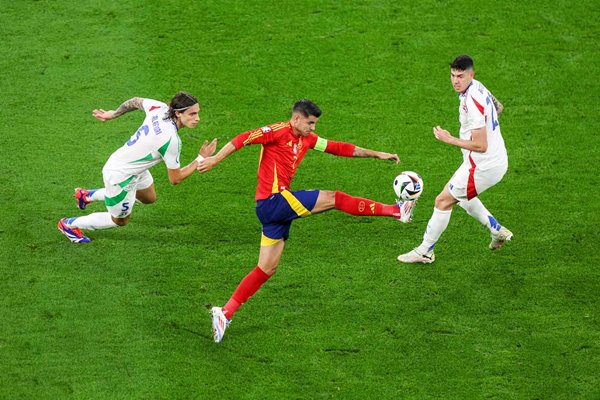 Alvaro Morata Spain controls the ball v Riccardo Calafiori Italy EURO 2024