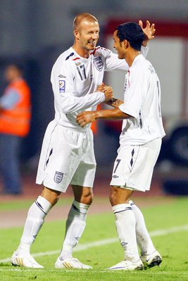 David Beckham congratulates Theo Walcott v Croatia