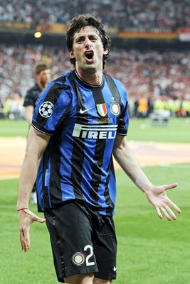 Diego Milito of Inter Milan celebrates beating Bayern