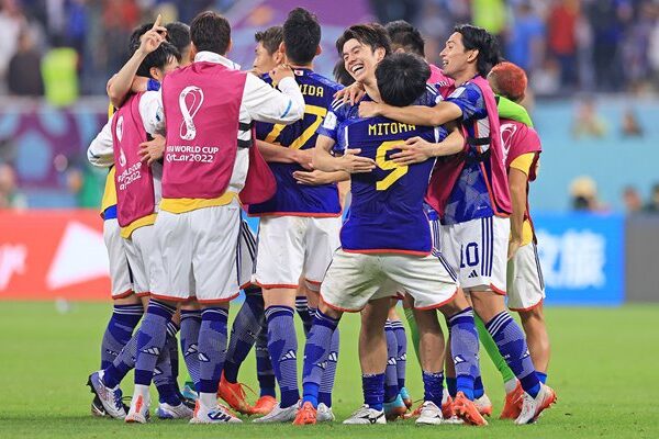 Japan celebrate win v Spain and progress from Group E World Cup 2022