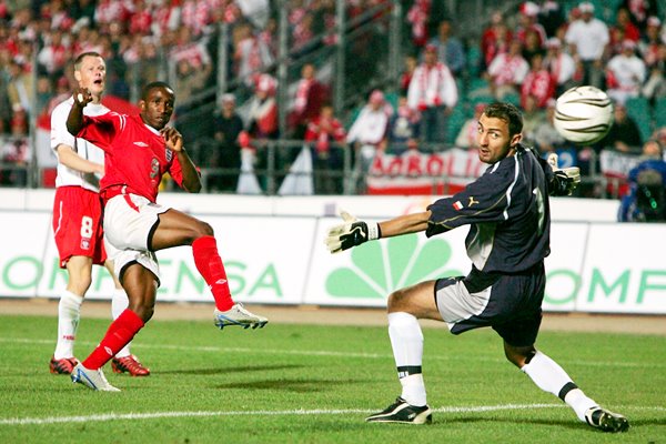 Jermain Defoe of England scores