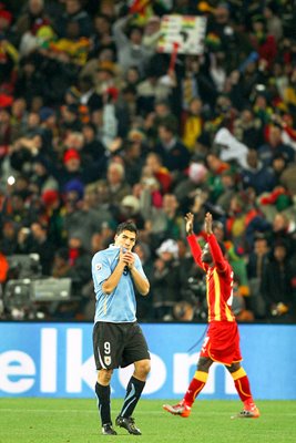 Luis Suarez of Uruguay is sent off