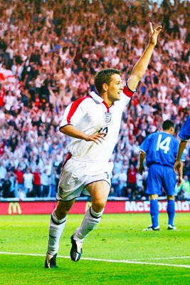 Michael Owen celebrates