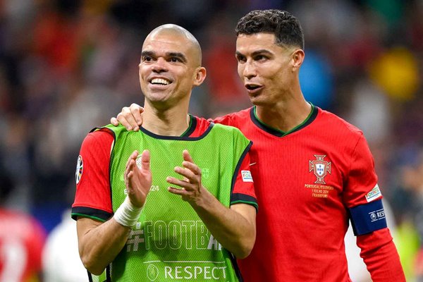 Pepe and Cristiano Ronaldo Portugal celebrate penalties win v Slovenia Last 16 EURO 2024