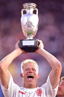 Peter Schmeichel Denmark goalkeeper celebrates with Euro 1992 trophy