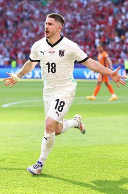 Romano Schmid Austria celebrates scoring v Netherlands Berlin EURO 2024