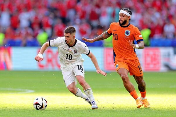Romano Schmid Austria v Memphis Depay Netherlands Berlin EURO 2024