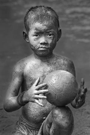 The Champion — Boy with Soccer Ball Poster