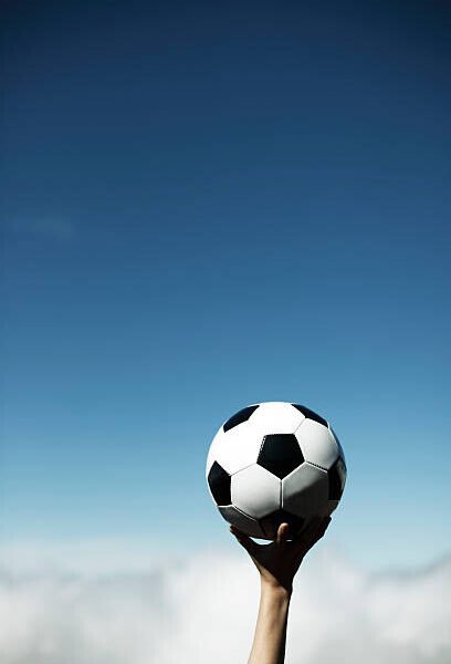 Soccer Ball Against Blue Sky Poster